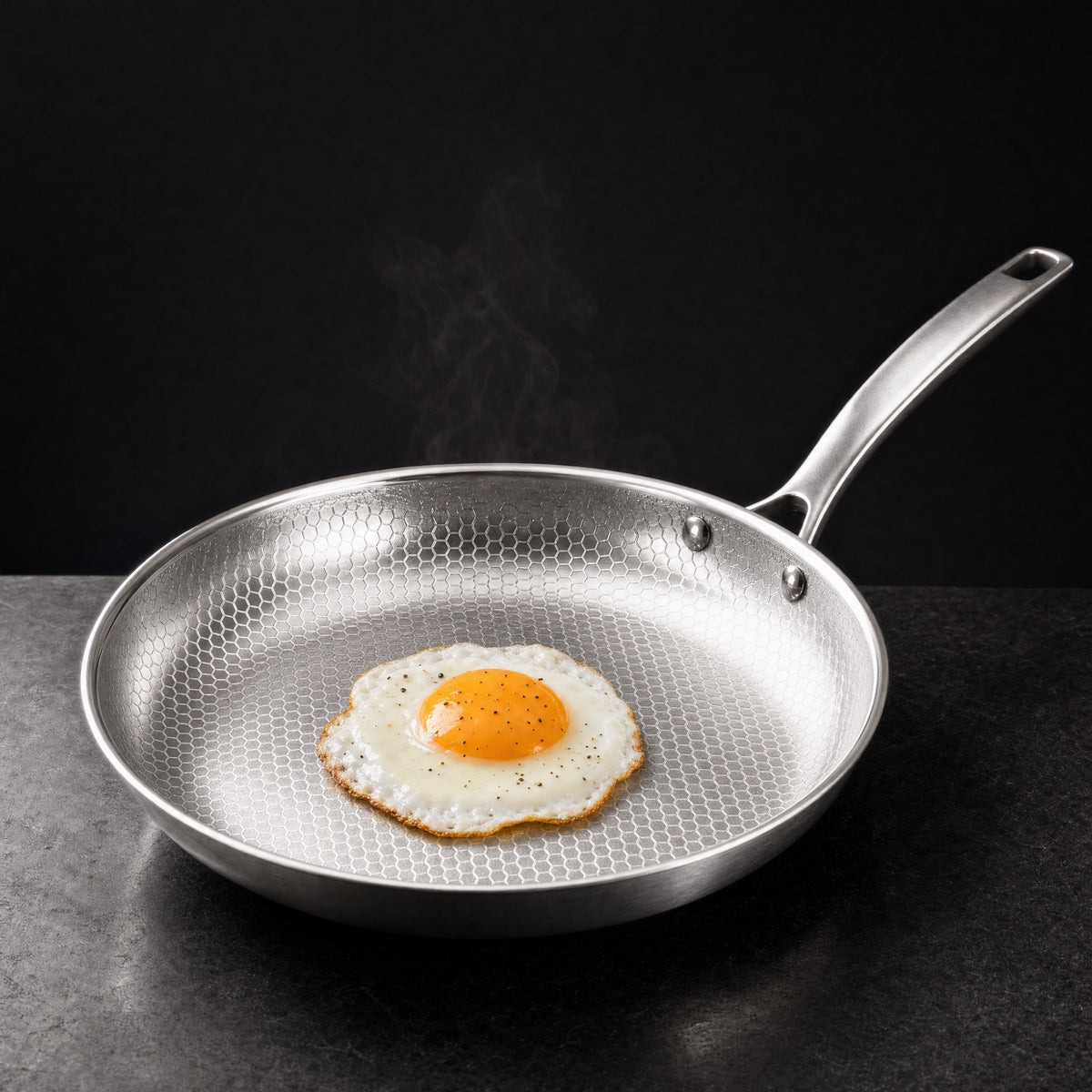 A fried egg in the Kitchi Titanium Fry Pan